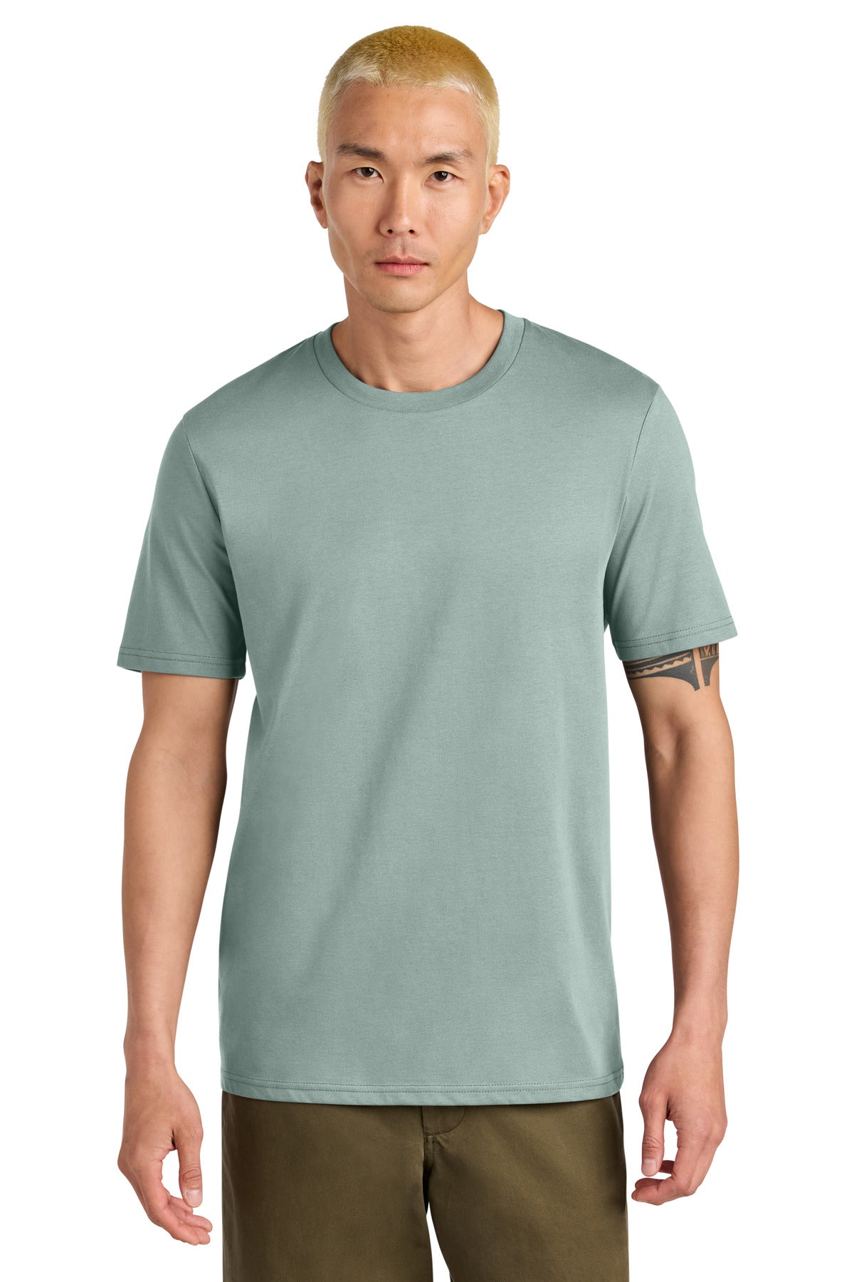 Man wearing a light green t-shirt on a white background