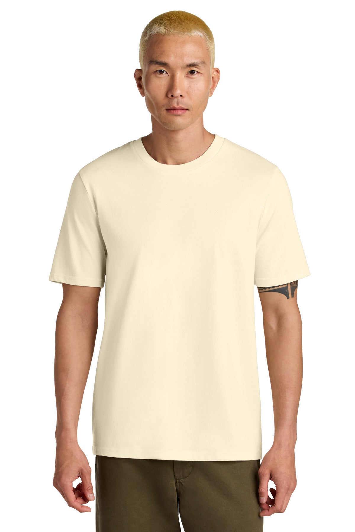 Man wearing a light yellow t-shirt on a white background