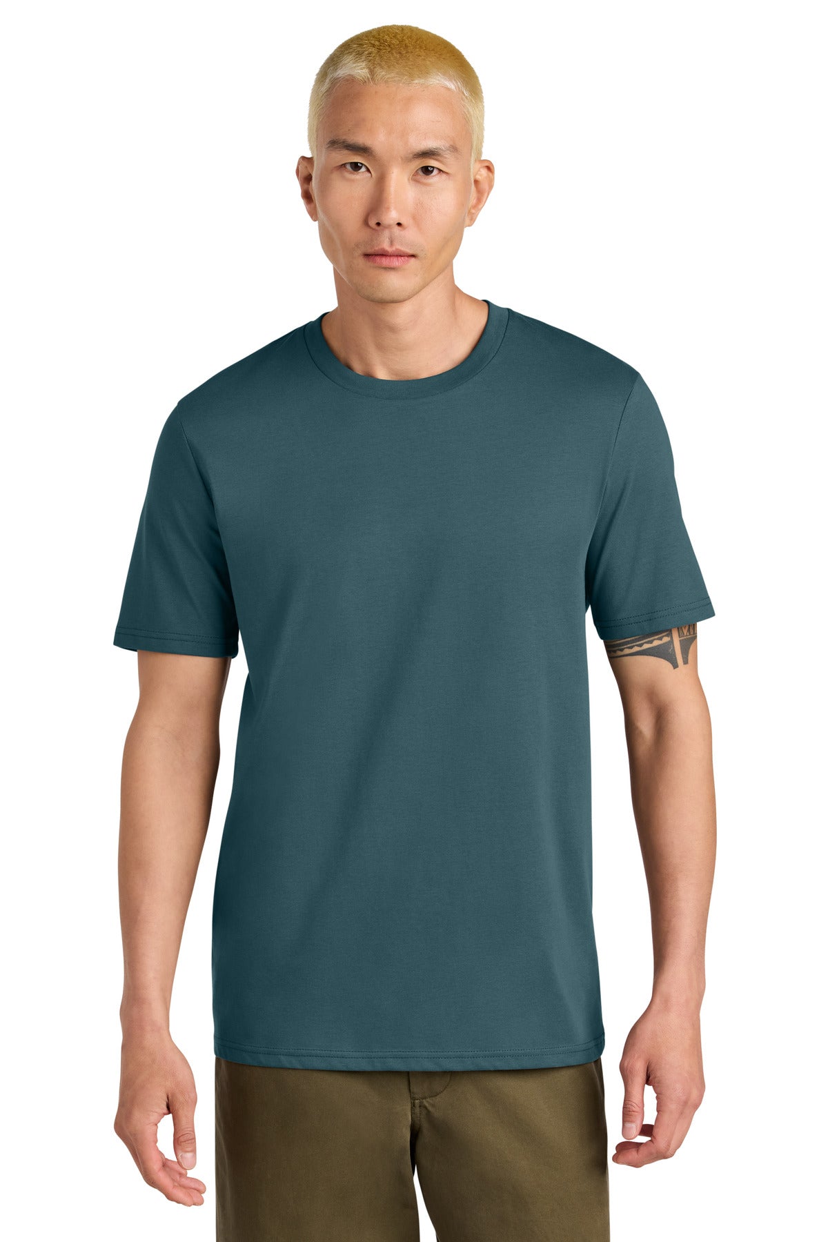 Man wearing a teal t-shirt on a white background