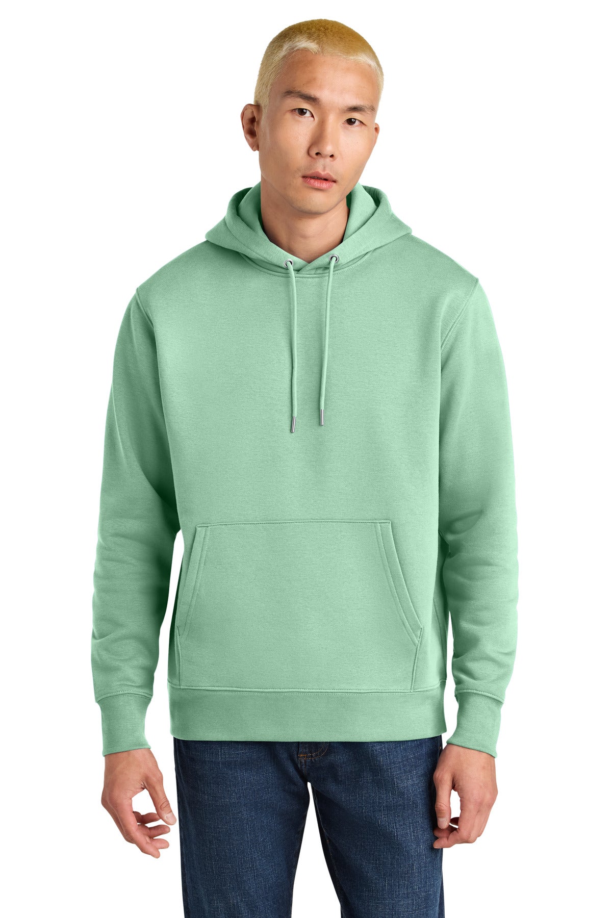 Person wearing a light green hoodie on a white background