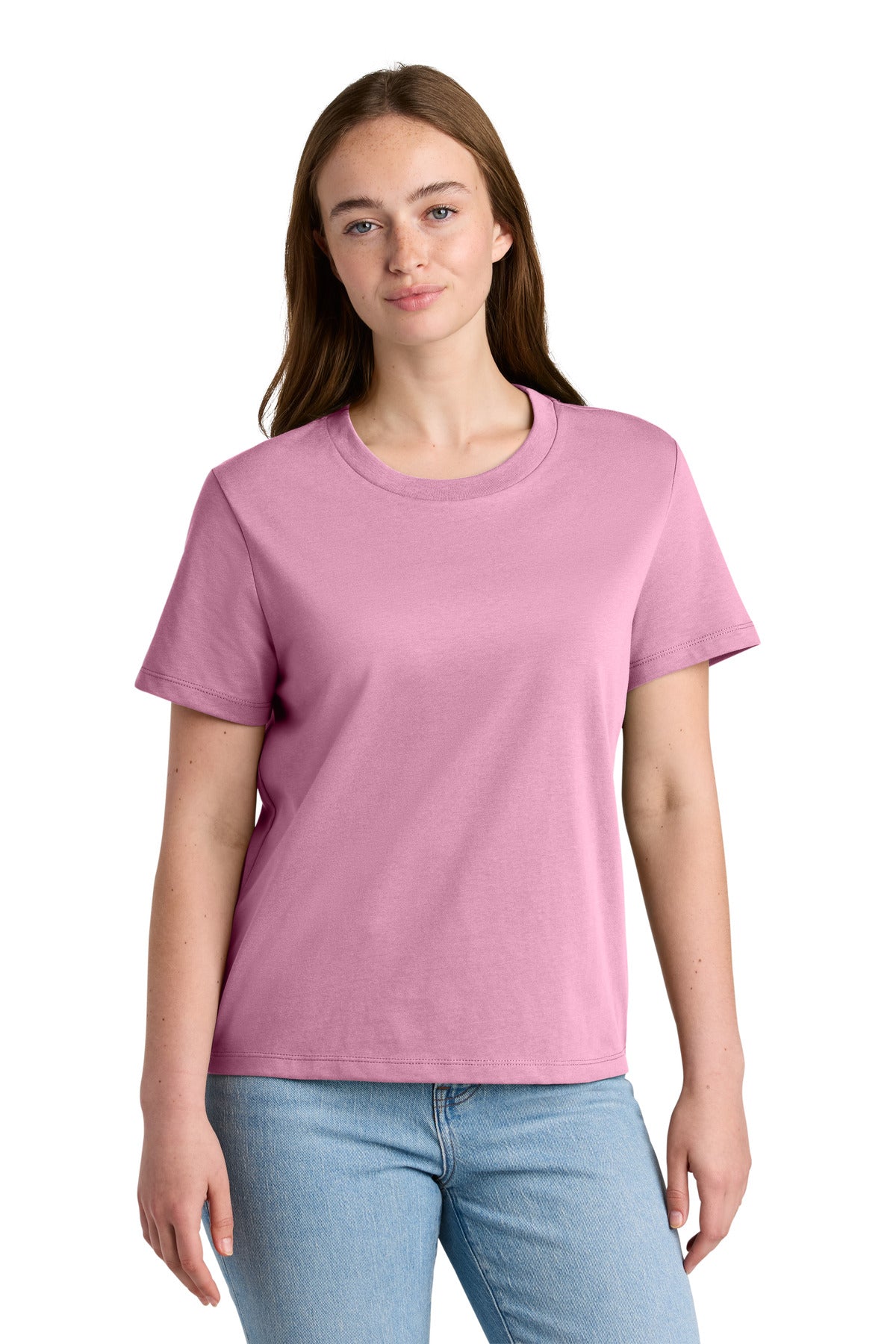 Woman wearing a pink t-shirt and blue jeans on a white background