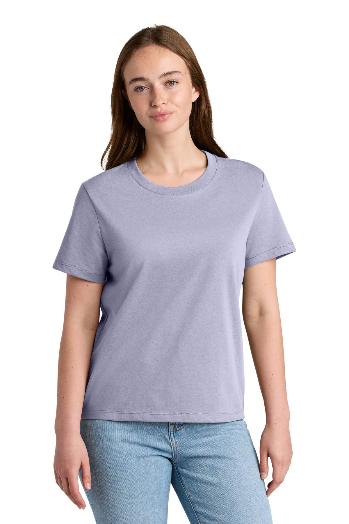 Woman wearing a light purple t-shirt and blue jeans on a white background