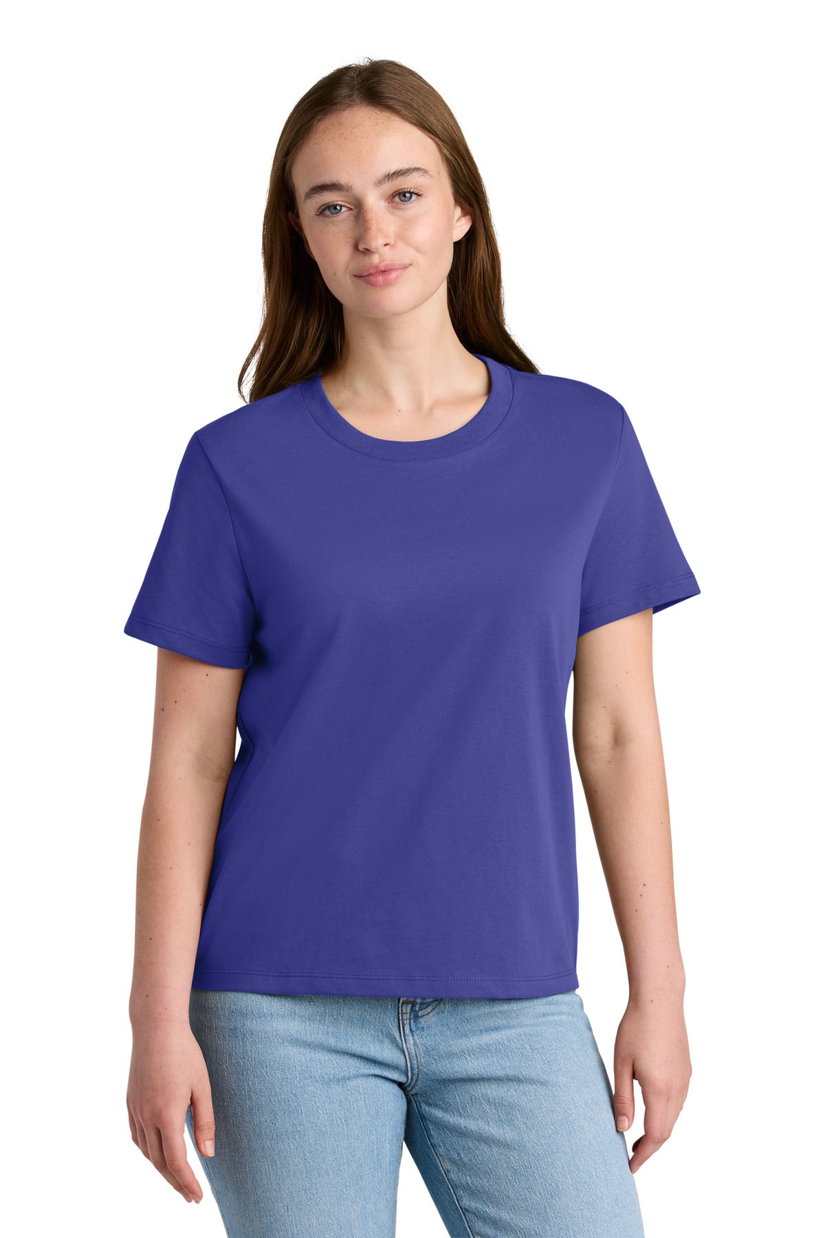 Woman wearing a purple t-shirt and light blue jeans on a white background