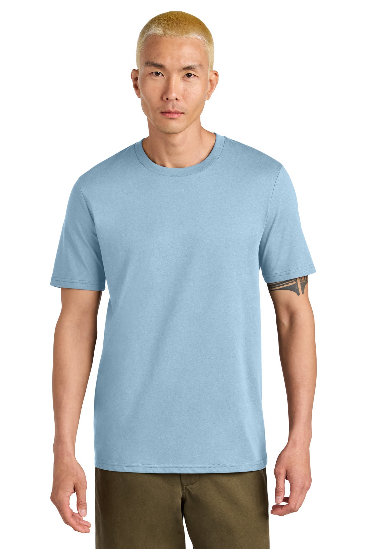 Man wearing a light blue t-shirt on a white background