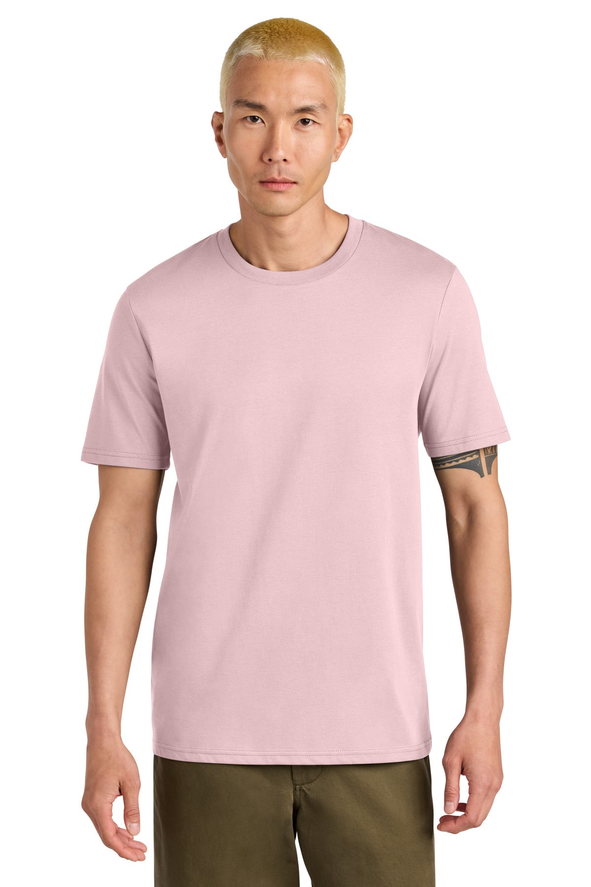 Man wearing a light pink t-shirt on a white background