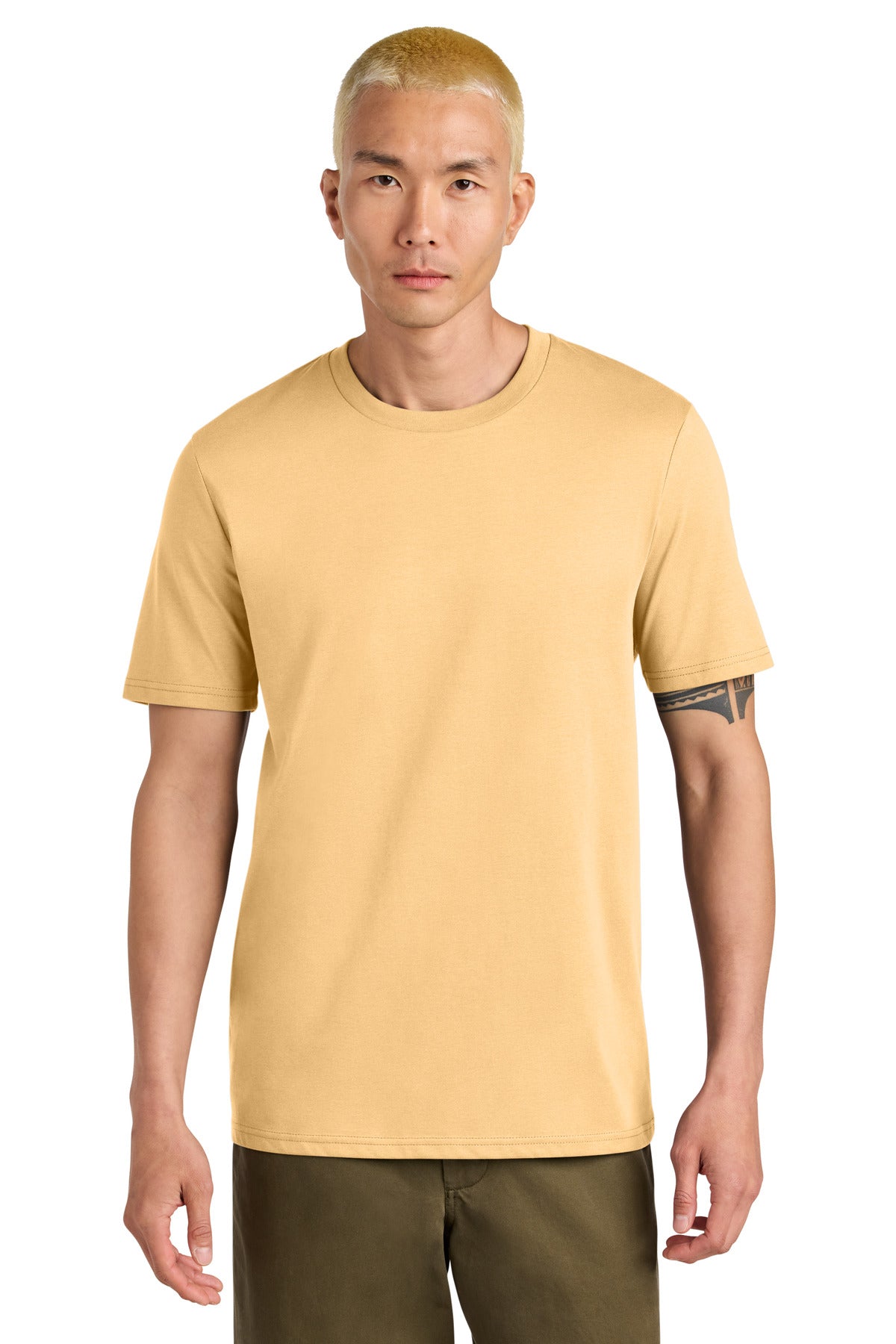 Man wearing a yellow t-shirt with a visible brand logo on a white background