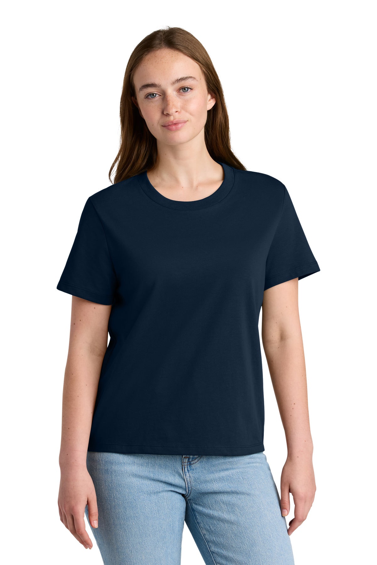 Woman wearing a navy blue t-shirt and light blue jeans on a white background