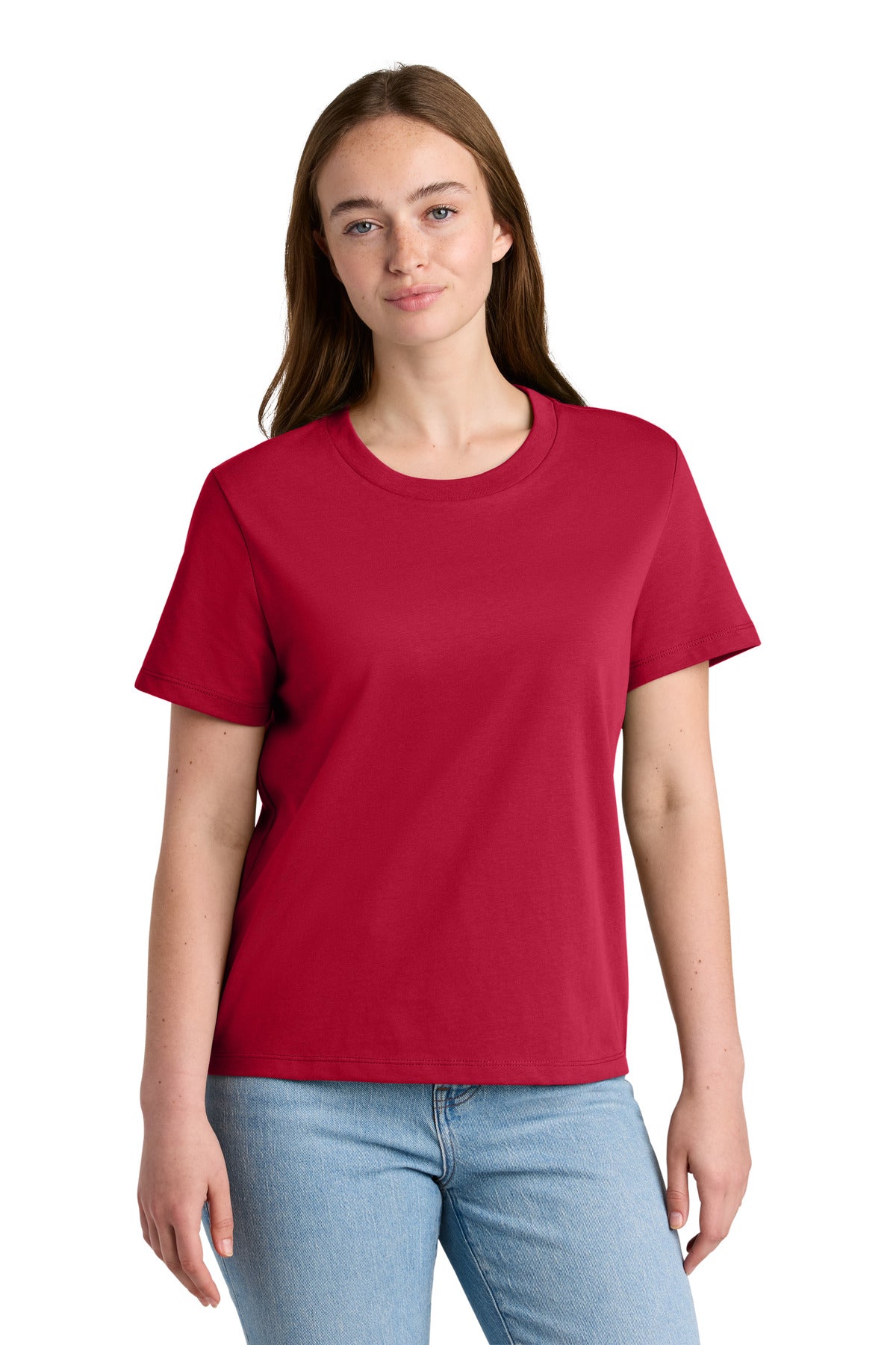 Woman wearing a red t-shirt and blue jeans on a white background